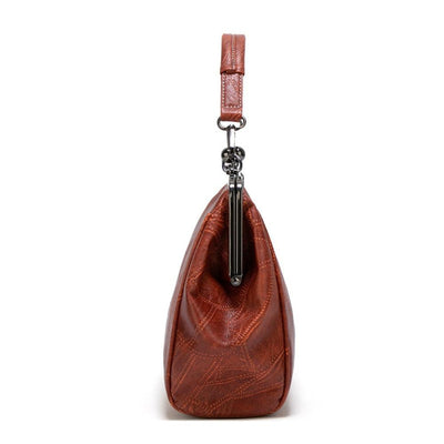 Mila | Classic Vintage Bag Featuring an Elegant Clasp Closure
