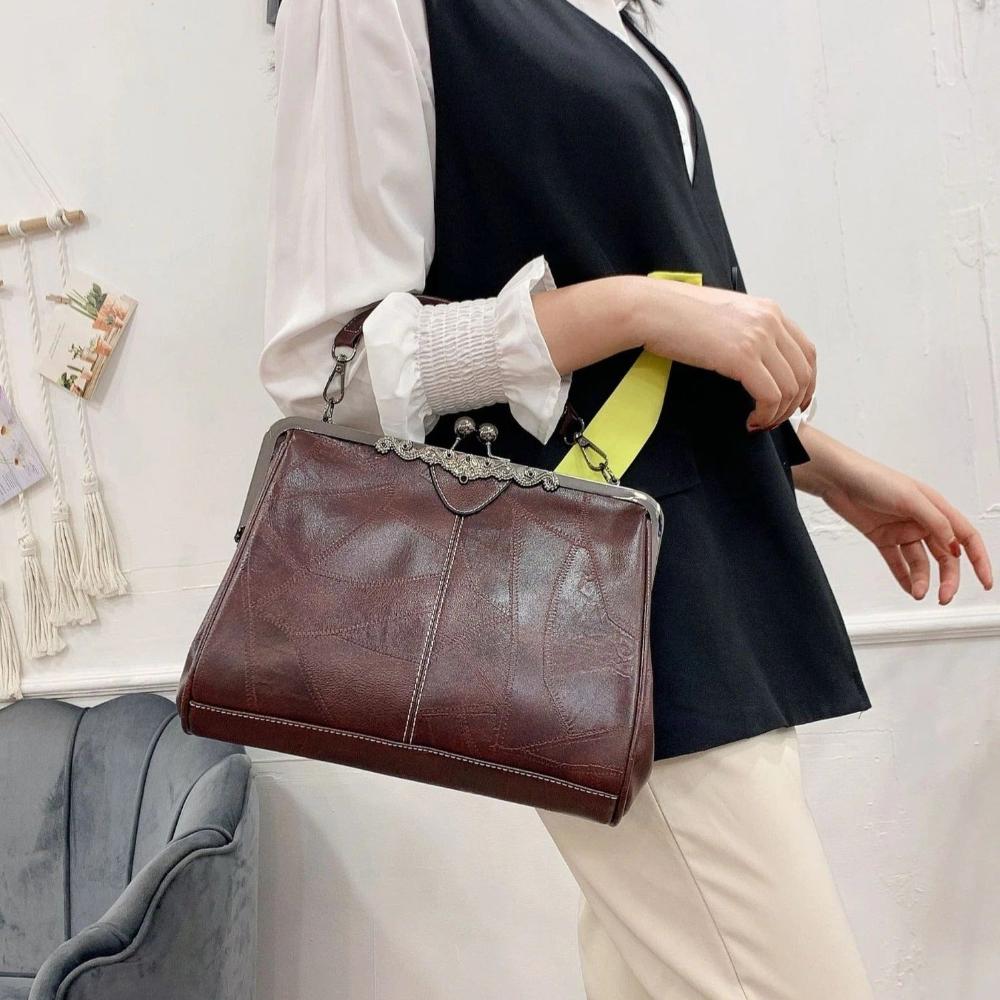 Mila | Classic Vintage Bag Featuring an Elegant Clasp Closure