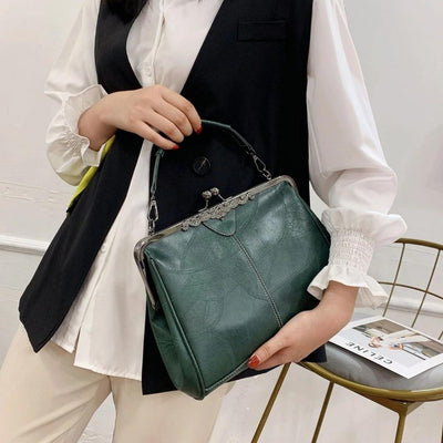 Mila | Classic Vintage Bag Featuring an Elegant Clasp Closure