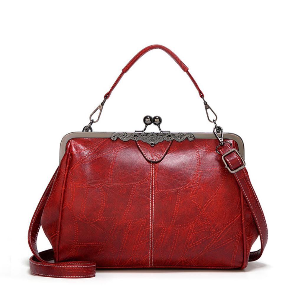 Mila | Classic Vintage Bag Featuring an Elegant Clasp Closure