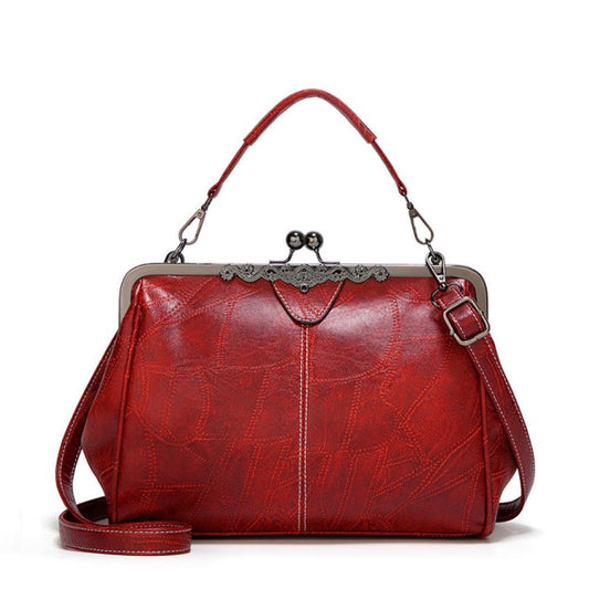 Mila | Classic Vintage Bag Featuring an Elegant Clasp Closure